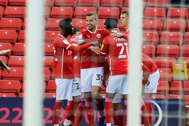 Goal: Michal Helik is congratualted after scoring the opening goal for Barnsley.