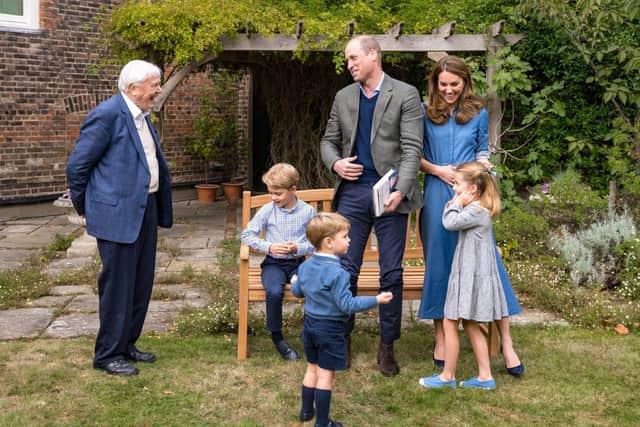 Sir David Attenborough with the Duke and Duchess of Sussex, and their three children.