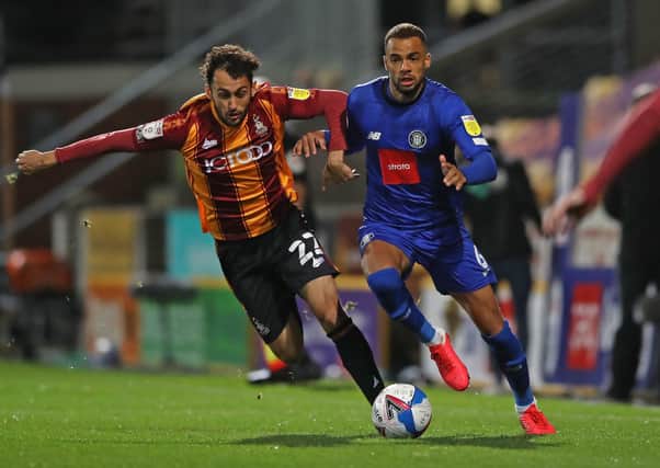 Levi Sutton, left, is back in contention for Bradford City to face Walsall on Tuesday night. Picture: Martin Rickett/PA