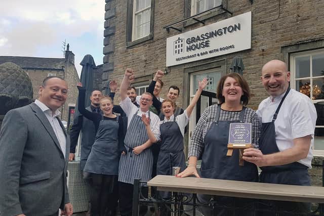 Partner at Garbutt and Elliott, Jeremy Oliver, presenting the Grassington House team and owners John and Sue Rudden with their 'Nourish Yorkshire' award.