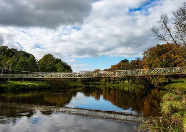 Autumn colours reflected in the River Wharfe at the stepping stones and suspension bridge below the village of Hebden in Wharfedale
1st October 2020.  Picture: Bruce Rollinson