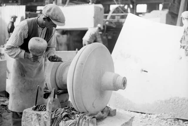 15th October 1931:  A mason at work at the John Pearce Portland Stone Quarries on the Isle of Portland in Dorset.  (Photo by Fox Photos/Getty Images)