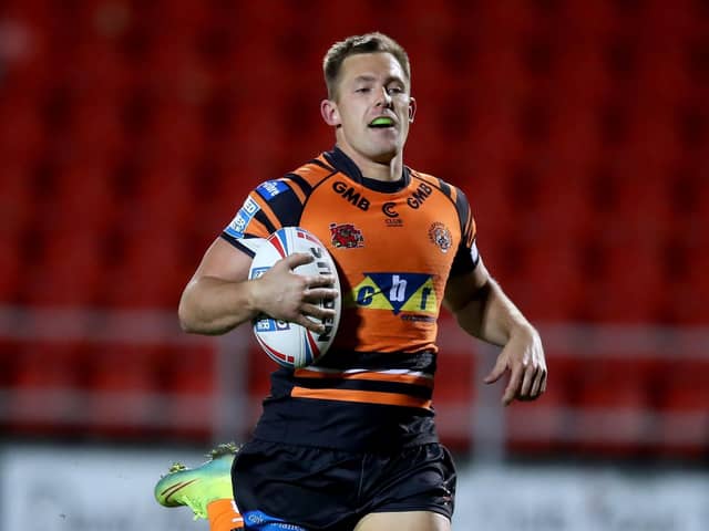 Castleford Tigers' Greg Eden: On his way to score his side's fourth try against Hull KR at the Totally Wicked Stadium, St Helens. Picture: PA