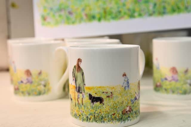 A close-up of the mug featuring Amanda, Clive and the children. It's a best-seller after viewers spotted it on the Channel 5 series Our Yorkshire Farm.