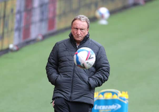 NOW ... Middlesbrough manager Neil Warnock kicks the ball back into play during the Sky Bet Championship match at the Riverside Stadium. Picture: Richard Sellers/PA