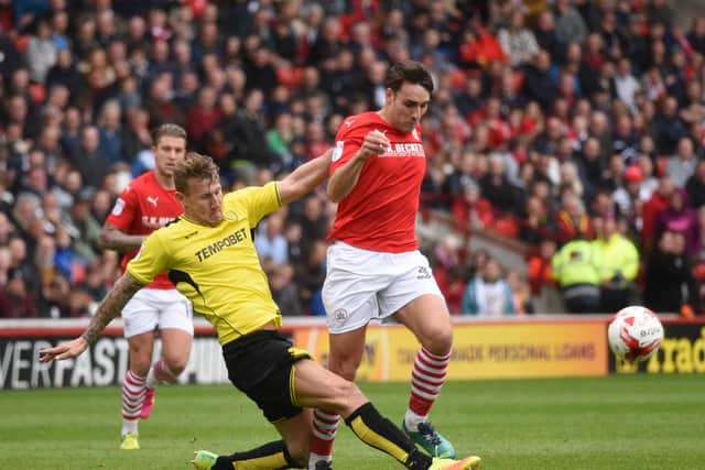 FAMILIAR FACE: Matty James, in action for Barnsley against Burton Albion during his previous loan spell.