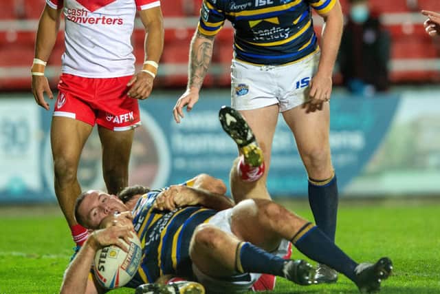 Callum Smith scores for the Rhinos at St Helens  (Picture: Bruce Rollinson)