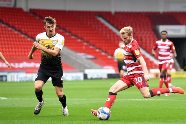 Doncaster's Josh Sims in action against Crewe  (Picture: Howard Roe/AHPIX LTD
)