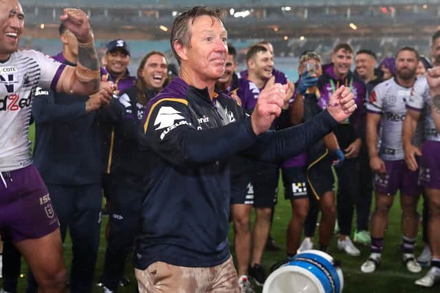 SETTING THE TONE: Melbourne Storm coach Craig Bellamy has Gatorade poured over him after winning the 2020 NRL Grand Final against Penrith Panthers. Picture: Cameron Spencer/Getty Images
