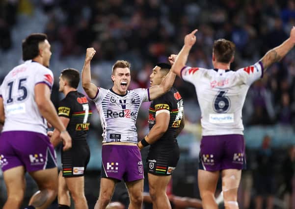 LEADING THE WAY: Melbourne Storm's Ryan Papenhuyzen and Cameron Munster celebrate winning the 2020 NRL Grand Final against Penrith Panthers. Picture: Cameron Spencer/Getty Images