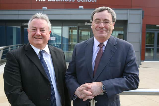 A photo of Sir George Buckley and University of Huddersfield Vice Chancellor Bob Cryan from 2011.