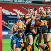 COMMITED: Castleford's Adam Milner is congratulated by team members on scoring a try against Hull KR last Thursday Picture by Allan McKenzie/SWpix.com