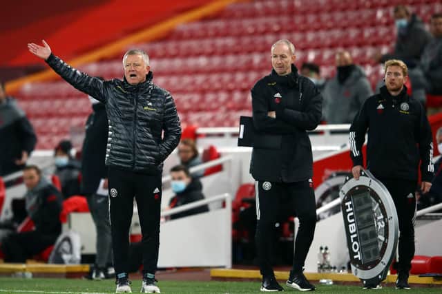 Sheffield United manager Chris Wilder and his assistant Alan Knill (right) on the touchline at Anfield. Picture: Michael Steele/PA