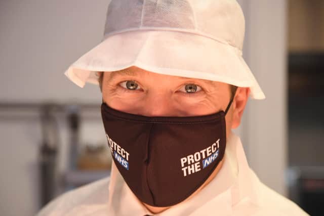 Health Secretary Matt Hancock, wearing a Protect the NHS branded face mask, during a visit to kitchens at the Royal Berkshire Hospital, Reading, to mark the publication of a new review into hospital food.