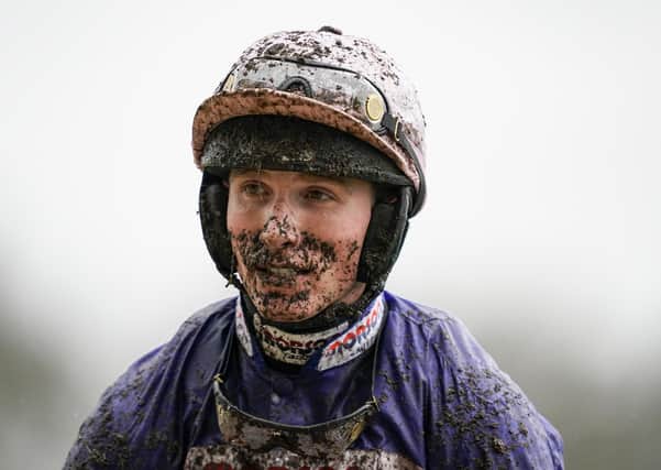A mud-splattered Harry Cobden after partnering Cyrname to Grade One glory at Ascot.