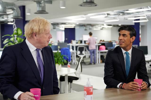 Prime Minister Boris Johnson and Chancellor of the Exchequer Rishi Sunak during a visit to the headquarters of Octopus Energy in London. Photo: PA