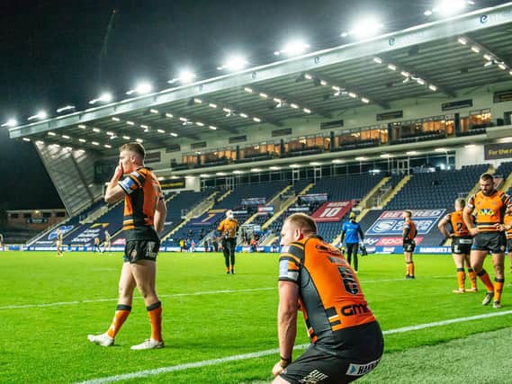 Castleford Tigers players after conceding another try against Leeds Rhinos on Monday night. (Allan McKenzie/SWpix.com)