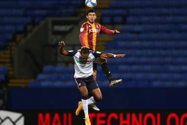 UP WELL: Anthony O'Connor heads the ball away. Picture: Charlotte Tattersall/Getty Images.
