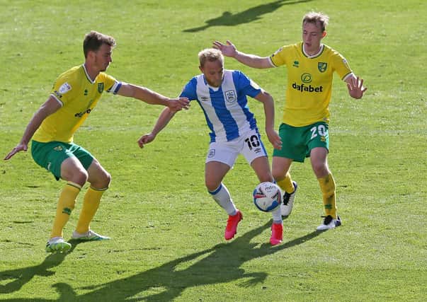 Huddersfield Town's Alex Pritchard (centre) has recovered from his quad injury. Picture: Richard Sellers/PA