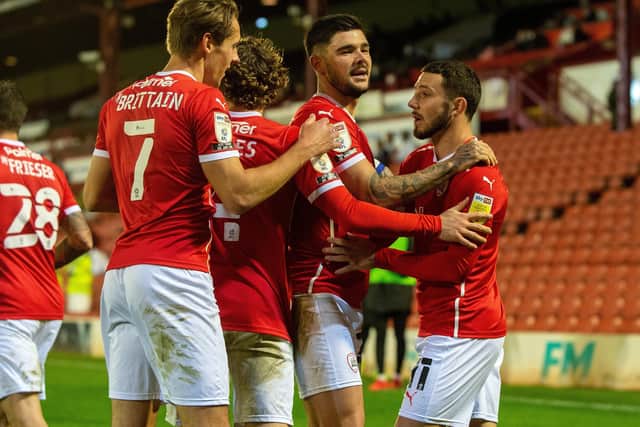 Conor Chaplin, far right, celebrates scoring Barnsley's second goal against QPR
 at Oakwell.  Picture: Bruce Rollinson