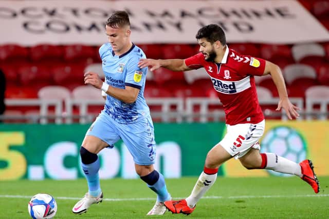 Coventry City's Leo Ostigard (left) and Middlesbrough's Sam Morsy battle for the ball at the Riverside. Picture: Richard Sellers/PA