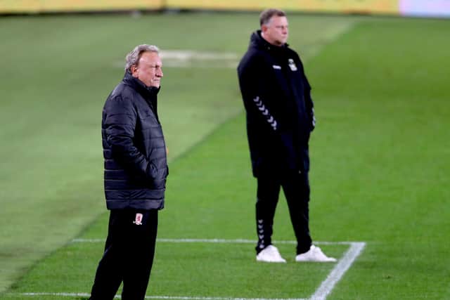 Middlesbrough manager Neil Warnock (left) and Coventry City manager Mark Robins watch from the touchline at Riverside Stadium. Picture: Richard Sellers/PA