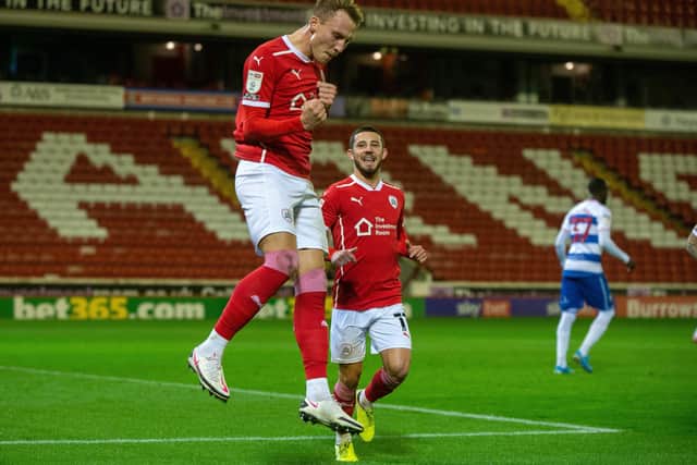 Cauley Woodrow celebrates opening the scoring for Barnsley  against QPR at Oakwell from the penalty spot. Picture: Bruce Rollinson
