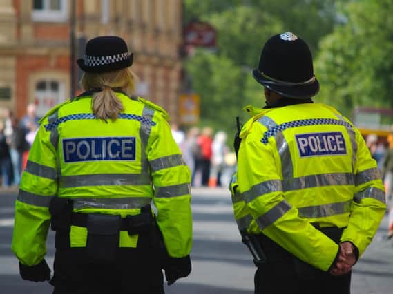 Police officers in Hull were doused in a liquid believed to be petrol in an assault yesterday. A man has been charged in connection.
