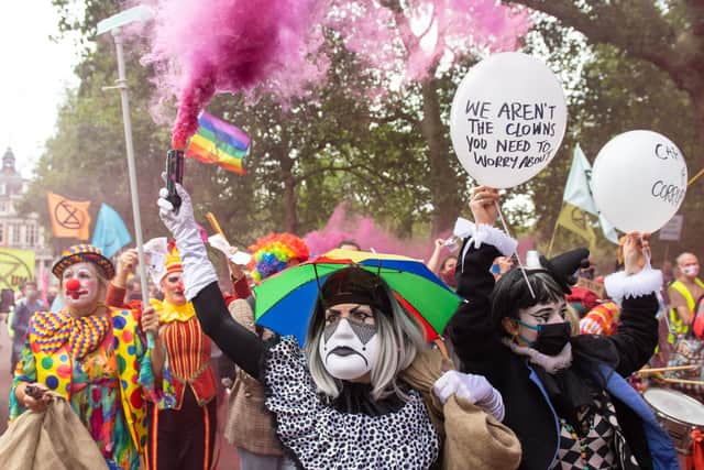 Extinction Rebellion protestors dressed as clowns as part of a protest to highlight climate change. Photo: Dominic Lipinski/PA Wire