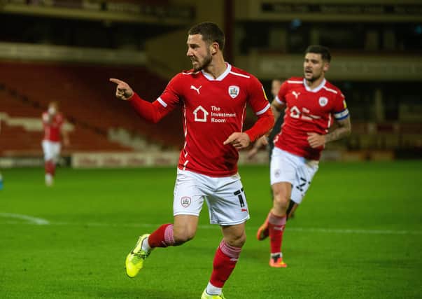 Conor Chaplin celebrates scoring Barnsley's second goal.
Barnsley against QPR
 at Oakwell on Tuesday night.  Picture: Bruce Rollinson