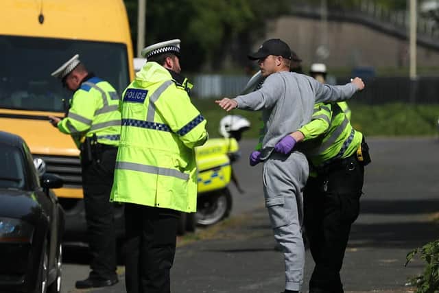 Officers carrying out a stop and search on a man as figures reveal police have carried out the highest number of stop and searches in seven years. Picture: pa