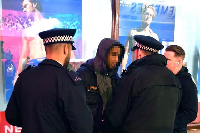 Officers carrying out a stop and search on a man as figures reveal police have carried out the highest number of stop and searches in seven years. Picture: pa