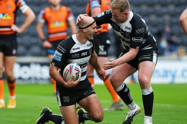 Hull FC's Danny Houghton scores against Castleford Tigers and is congratulated by fellow hooker Jordan Johnstone (Ash Allen/SWpix.com)