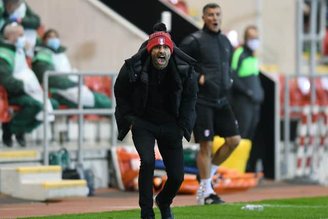 HAPY DAYS: Rotherham United's manager Paul Warne shouts from the touchline.
 Picture: Jonathan Gawthorpe.