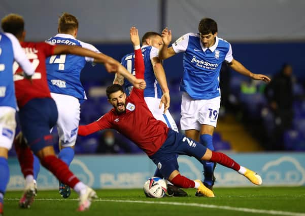 OVER YOU GO: Huddersfield Town's Pipa is fouled by Birmingham City's Mikel San Jose at St Andrew's. Picture: Michael Steele/Getty Images