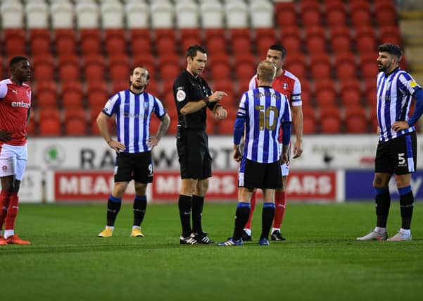 Brief respite: Reports of a drone forced the Rotherham and Wednesday players off the field briefly - and things got no better for the Owls on their return.
Picture : Jonathan Gawthorpe
