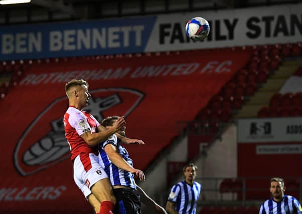 On target: Rotherham's Jamie Lindsay scores his side's first goal against Owls.
Picture: Jonathan Gawthorpe