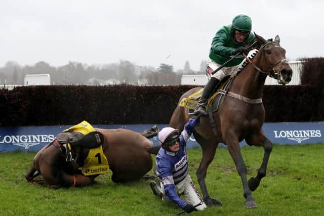 Cyrname, ridden by Harry Cobden, took a tumble in The Betfair Ascot Steeple Chase back in February. Picture: Bradley Collyer/PA Wire.