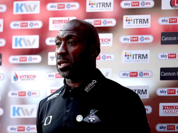 REFLECTION: Doncaster Rovers manager Darren Moore gives his reaction to Doncaster Rovers' display against Lincoln City. Picture: Steven Paston/PA Wire.