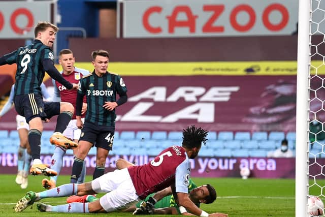 HOT PROPERTY: Leeds United's Patrick Bamford (left) scores his side's first goal at Villa Park last Friday. Picture: Laurence Griffiths/PA
