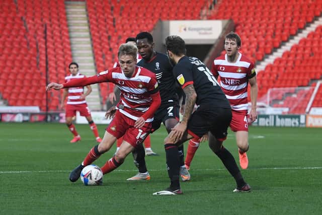 Doncaster's Matt Smith drives into the box. Picture: Howard Roe/AHpix