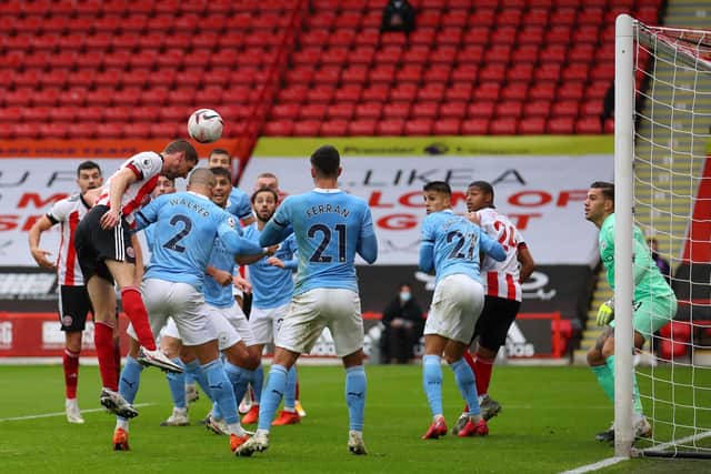 Close: Chris Basham heads towards goal. Picture: Simon Bellis/Sportimage