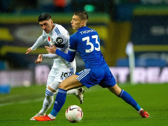 Pablo Hernandez tussles with Luke Thomas in Leeds United's home game with Leicester. Picture: Bruce Rollinson.