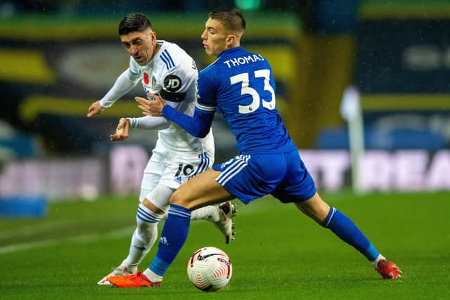 Leeds United's Pablo Hernandez battles for possession with Leicester City's past Luke Thomas  Picture: Bruce Rollinson