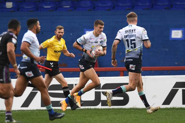 At the double: 
Rhinos winger Ash Handley scores his second try on the day he captained the side for the first time against Wakefield.

Picture: Jonathan Gawthorpe