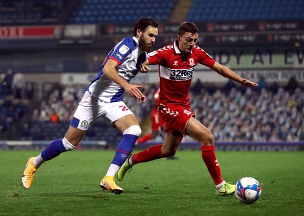 Middlesbrough's Dael Fry (right) and Blackburn Rovers' Ben Brereton battle for the ball at Ewood Park. Picture: Tim Goode/PA
