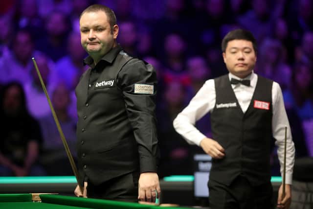 Stephen Maguire and Ding Junhui during day twelve of the Betway UK Championship at the York Barbican. (PIctures: Richard Sellers/PA Wire)