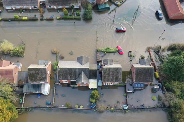 Changes to flooding insurance have been recommended following last November's floods in South Yorkshire.