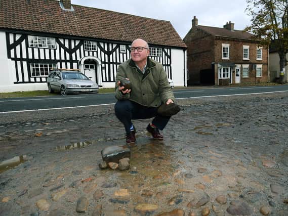 Nigel Denison, Chairman of Brafferton and Helperby Parish council, at the site where the cobbles are and a long forgotten 15th century well was found.
