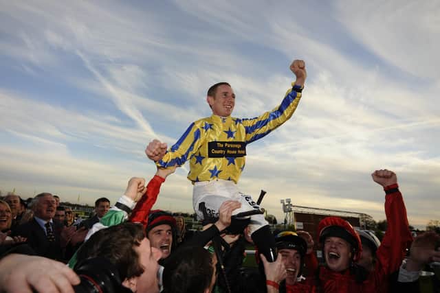 The jubilant scene at Doncaster after Paul Hanagan became champion jockey for the first time in November 2010.